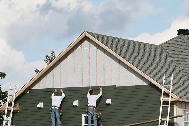 Professional Storm Damage Siding Repair technician working in Braintree, MA